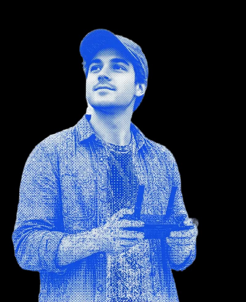 A drone pilot in a cap holding a controller, in blue halftone style.
